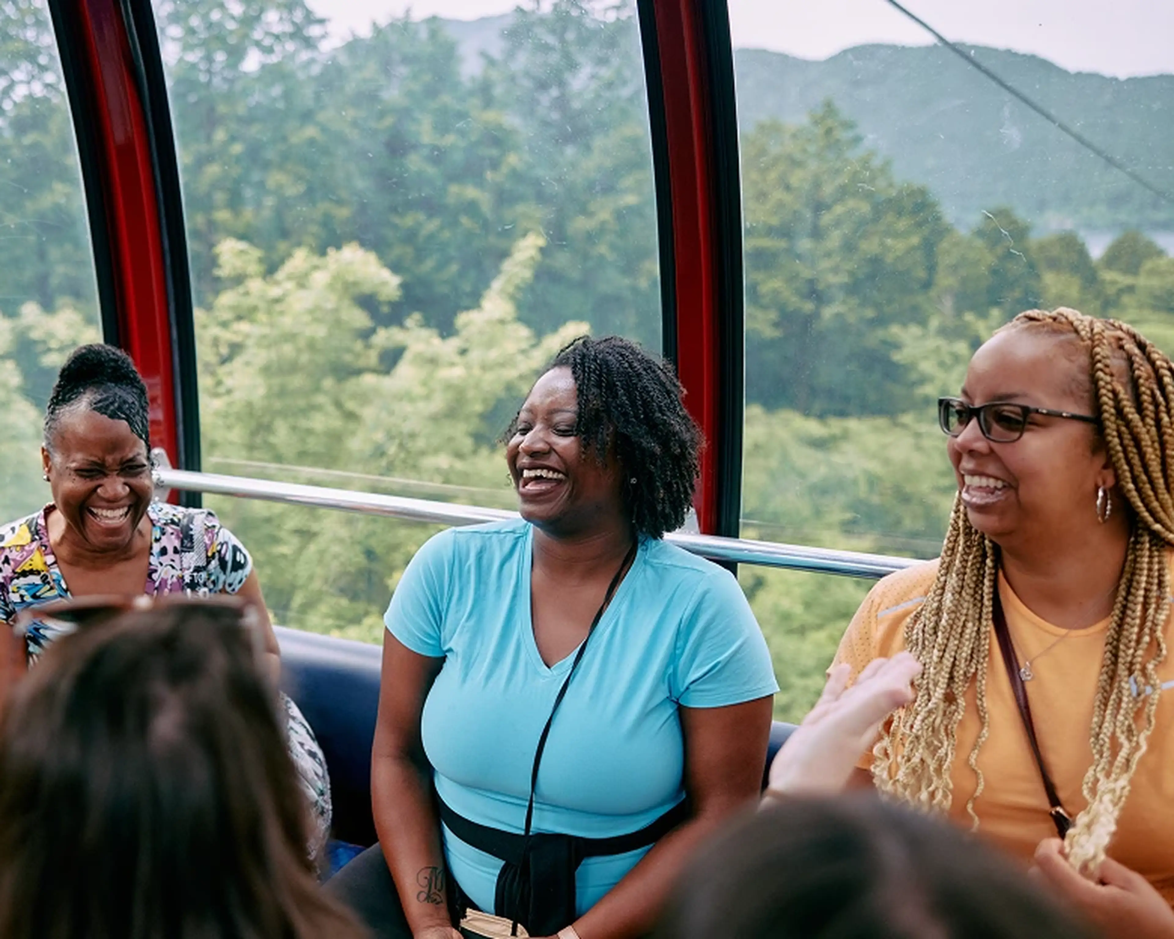 Women on a gondola laughing