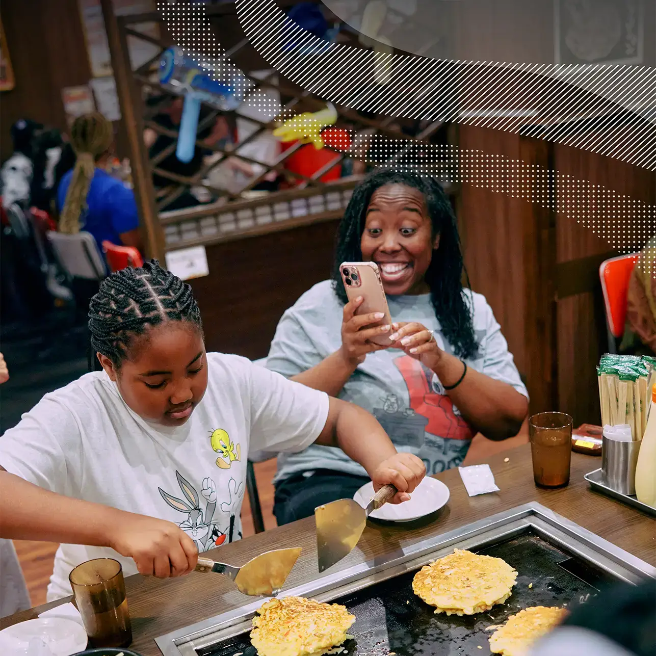 Student and group leader having a meal on tour in Tokyo, Japan