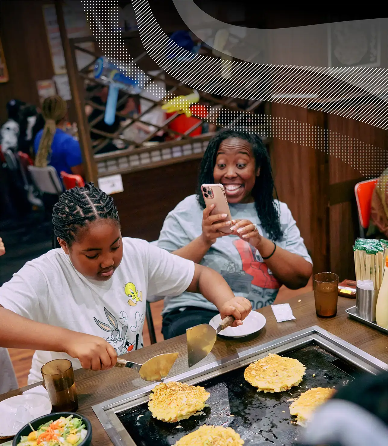 Student and group leader having a meal on tour in Tokyo, Japan