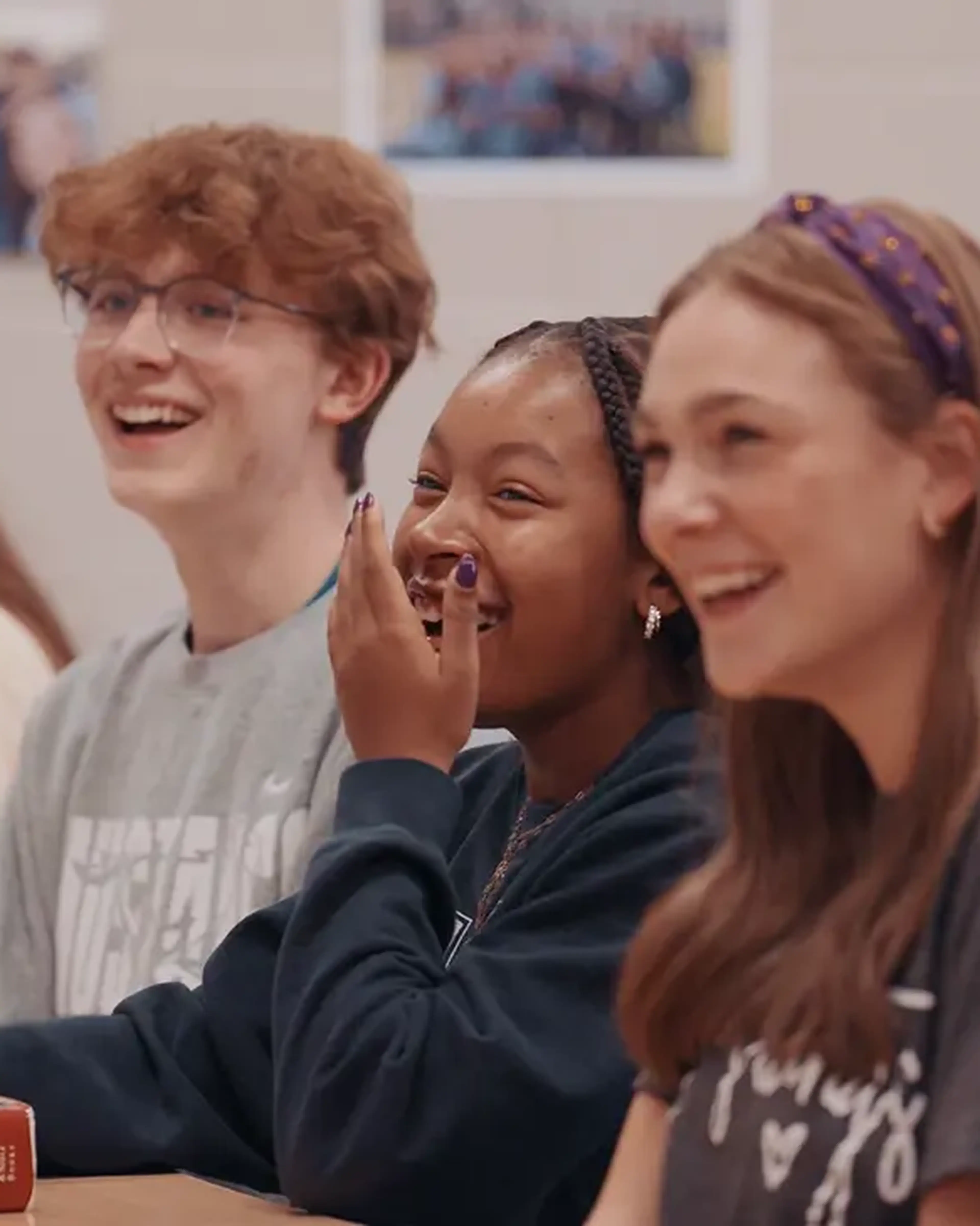 students laughing in a classroom