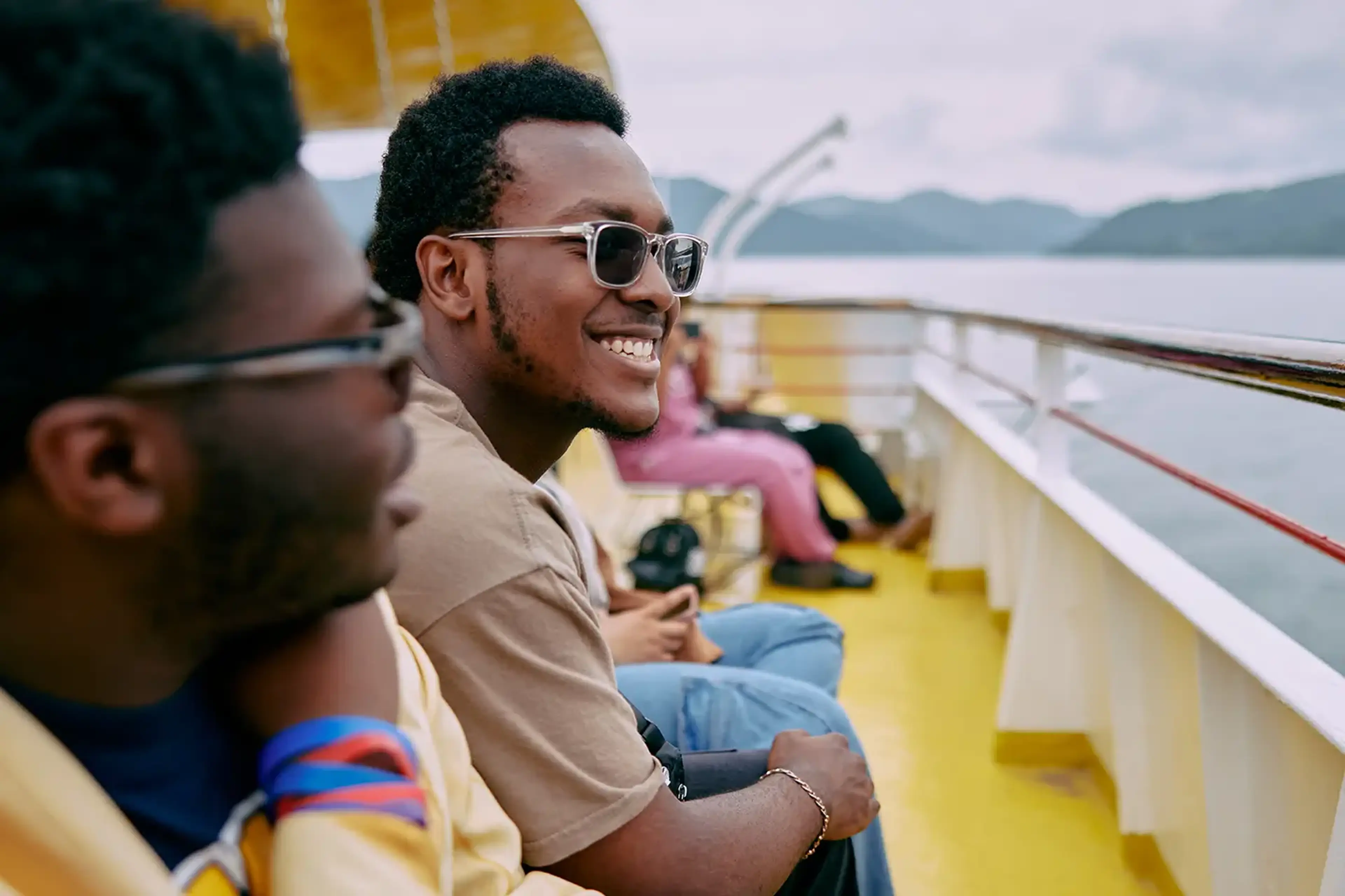 Travelers on a ferry on tour