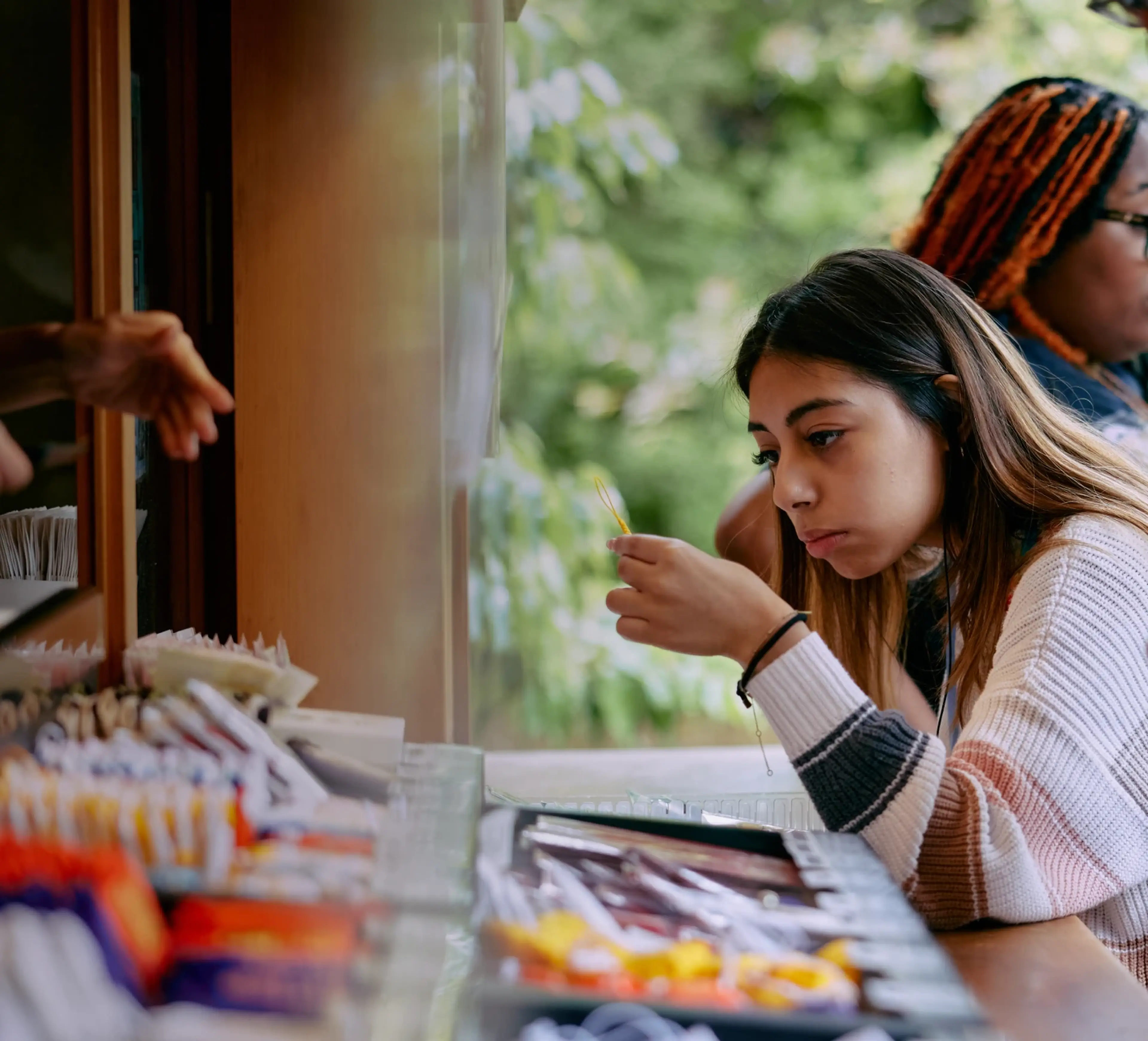 Student looking at teas for sale in Japan