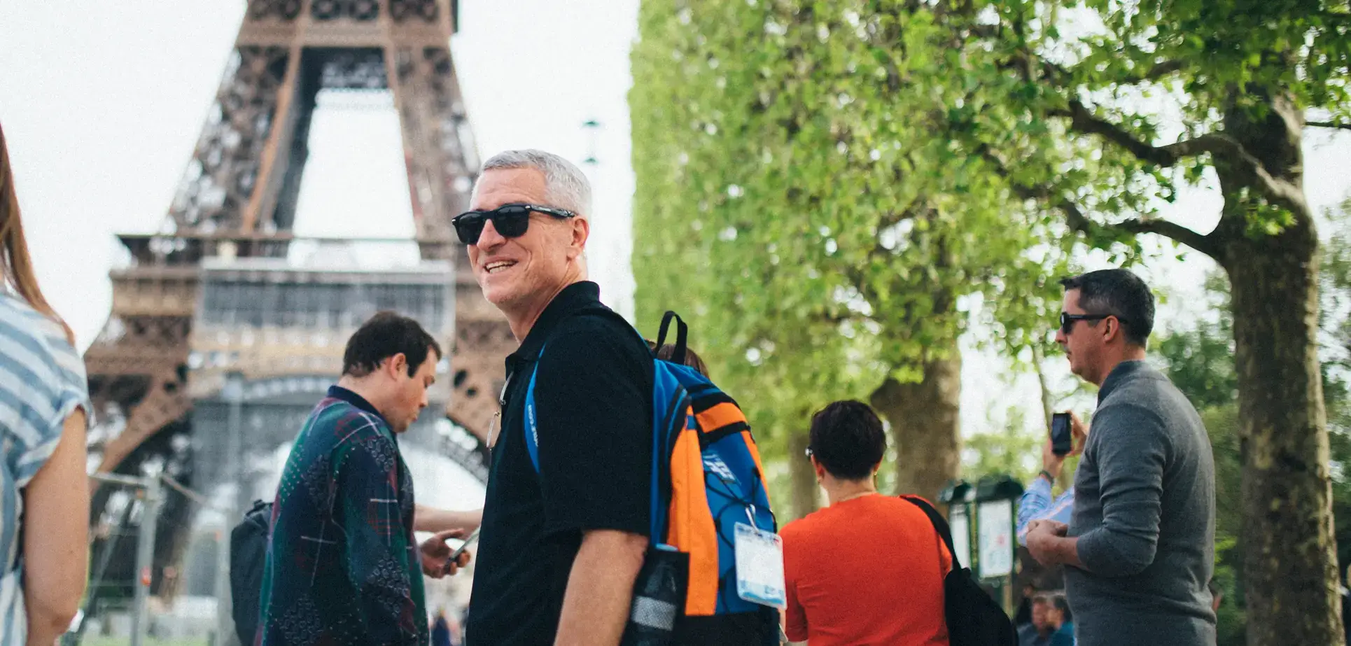 Adult traveler visiting the Eiffel Tower in Paris
