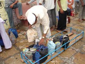 Mumbai dabbawala loading tiffins