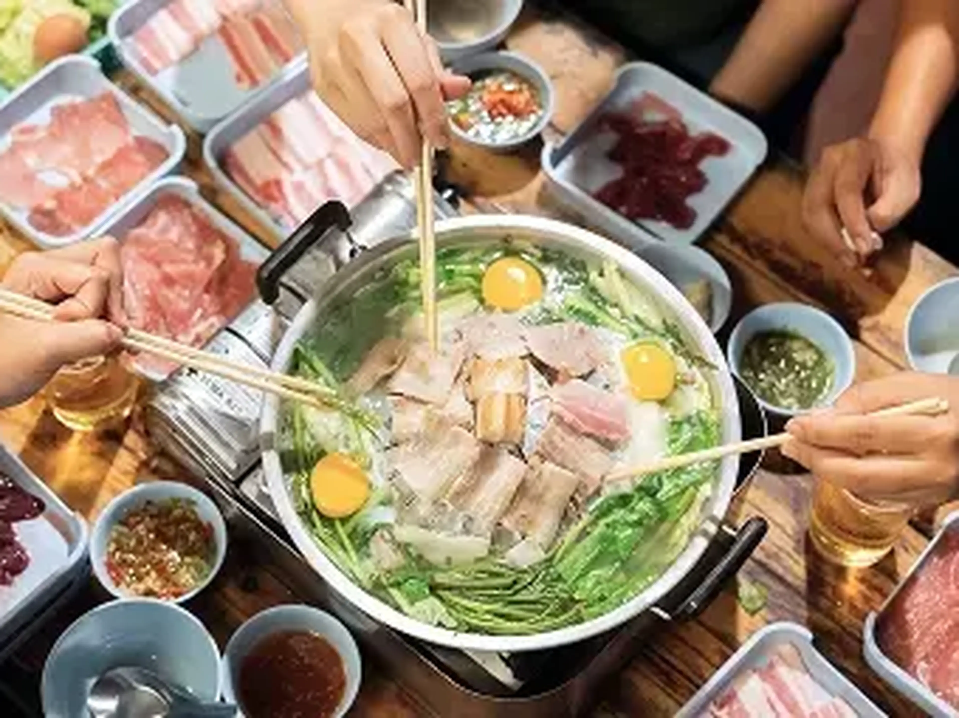 students sharing hot pot on an EF tour