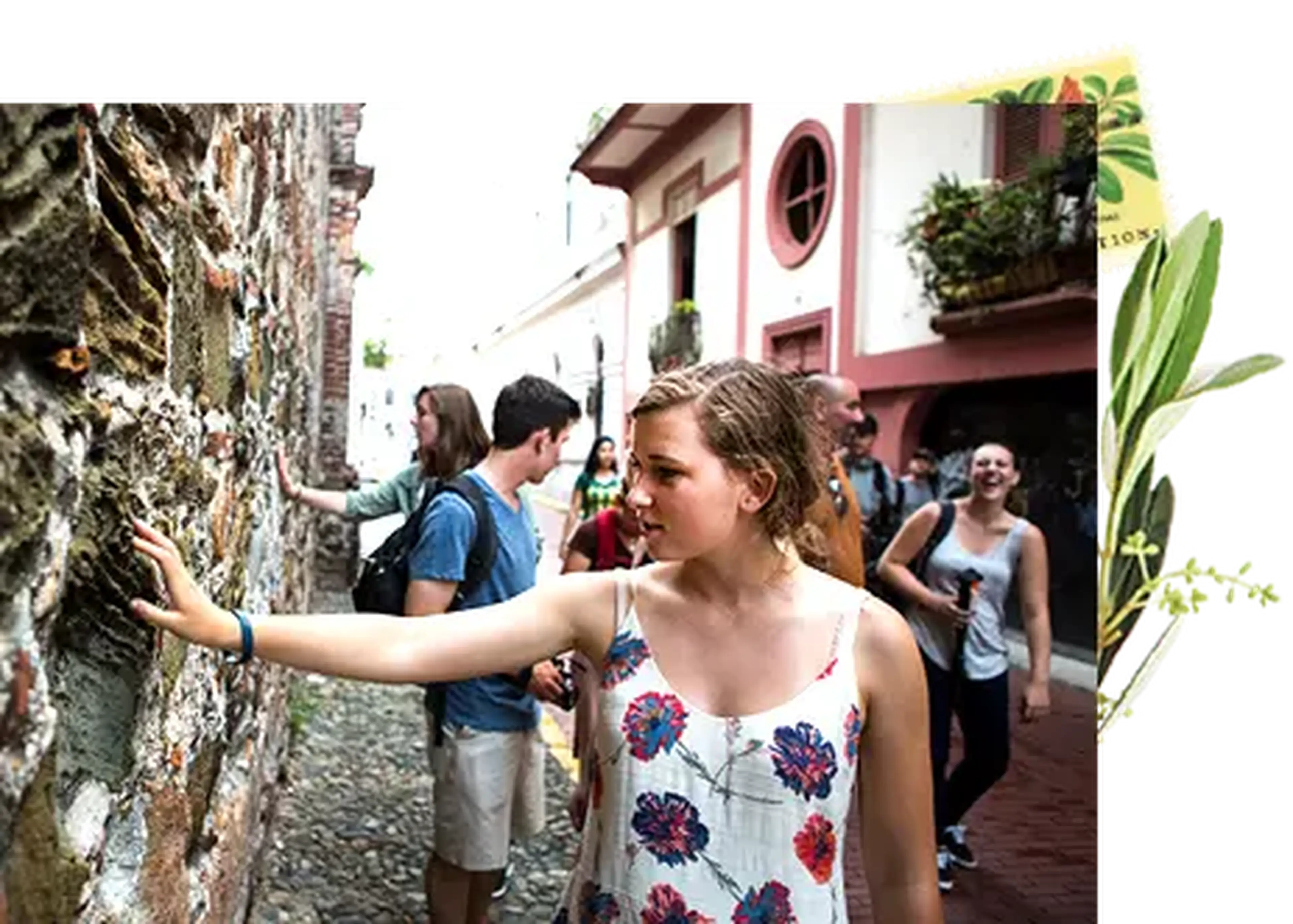 student touching a wall