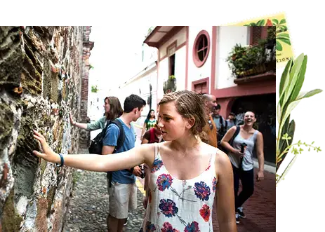 student touching a wall