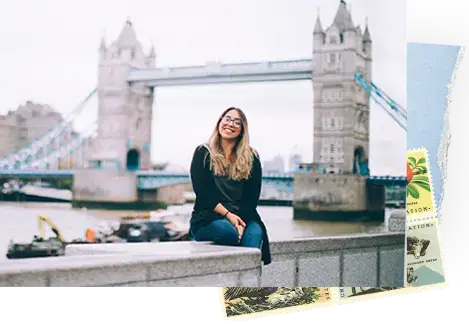 student sitting in front of london bridge