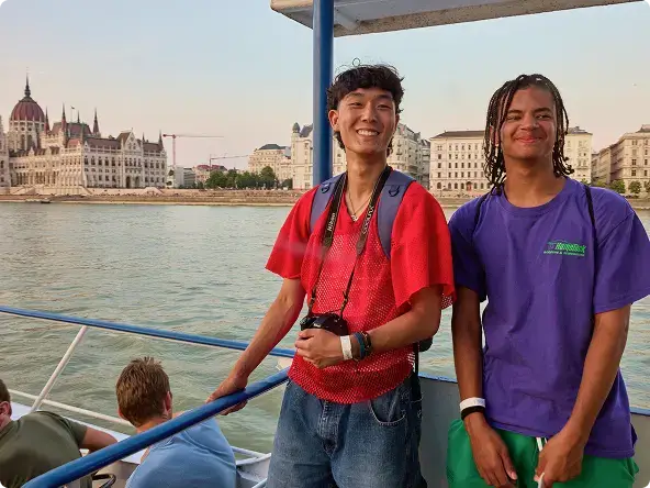 two students on a river boat in europe