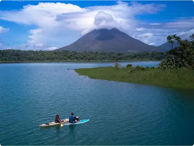 Kayak along Lake Arenal and learn how the volcano serves as a watershed for the lake