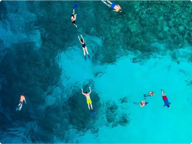 Boat to a secluded beach and go snorkeling in crystal-blue waters off the shore