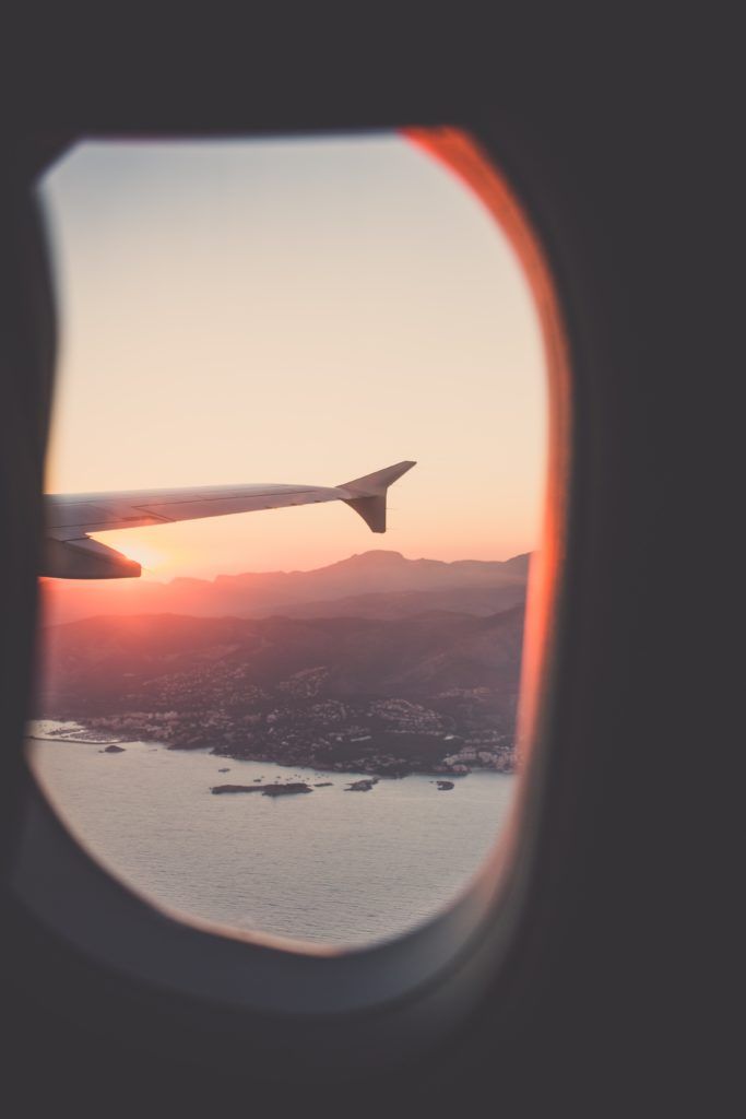 plane sunset window