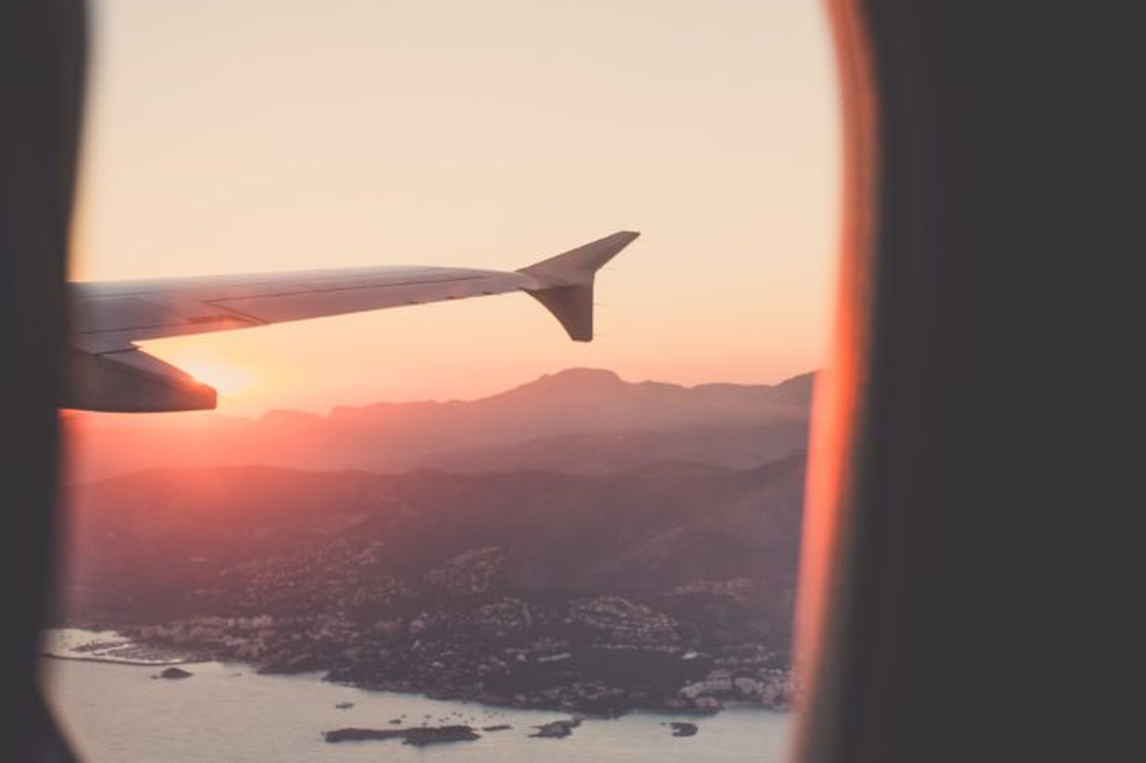 plane sunset window