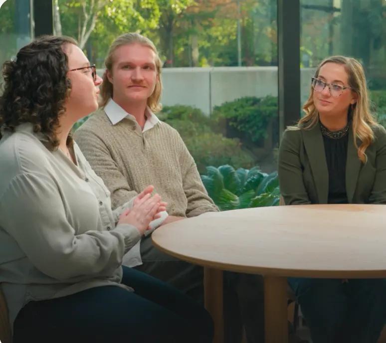 tour consultants and experience specialists talk around a table