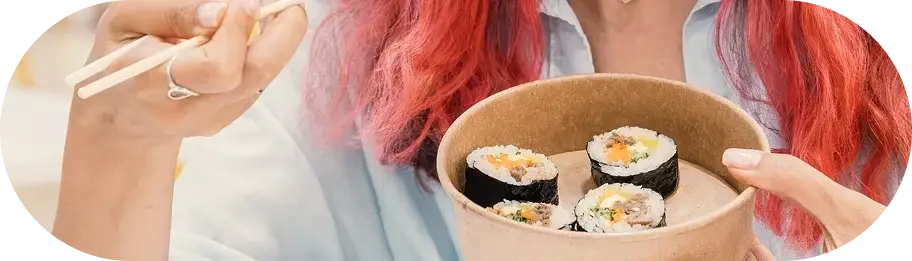 Student eating kimbap