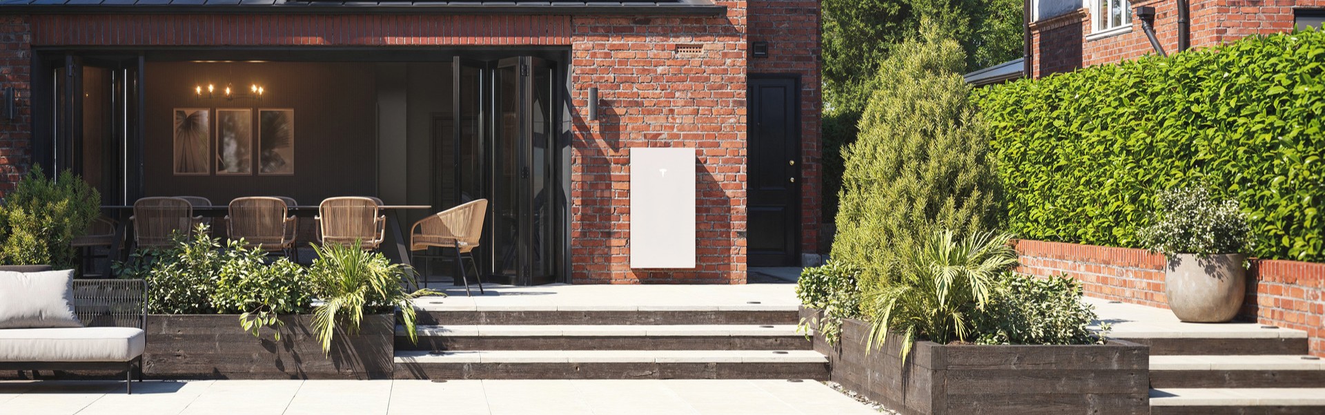 Tesla solar battery installed outside a home.