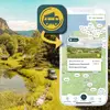 Van steht auf Stellplatz mit Bild von Stellplatz App und App-Icon von VanSite