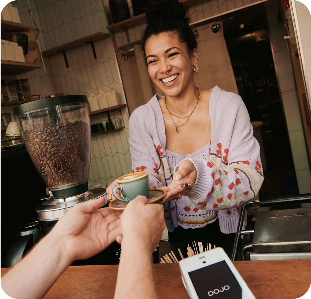 Business owner tapping to pay