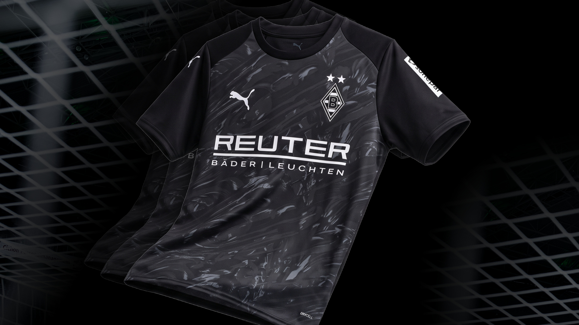 A black soccer jersey with white sponsor logos, Puma emblem, and a team crest, featuring subtle patterns on a dark background.