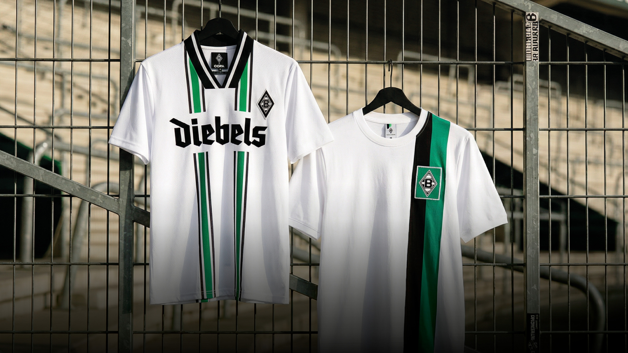 Two Borussia Mönchengladbach jerseys on hangers; one with vertical stripes, the other with a diagonal stripe.