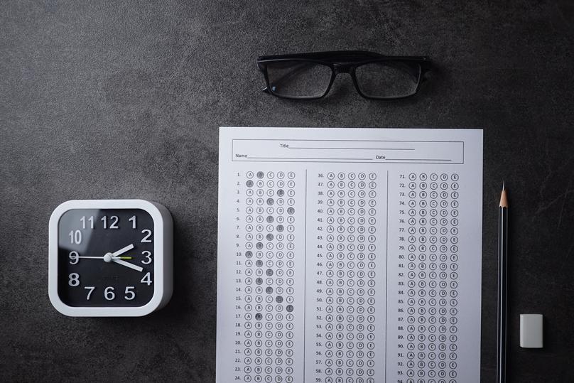 Completed Test with Clock, Pencil, and Eyeglasses