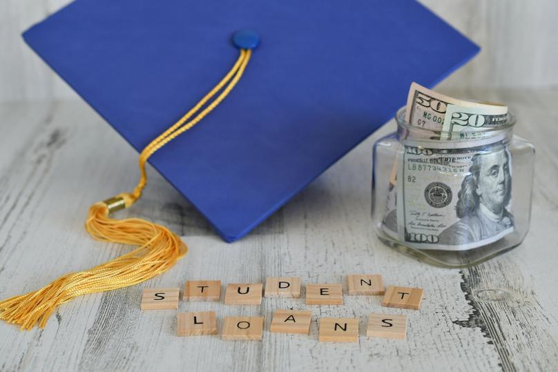 Paying for University: Student Loans and Graduation Cap