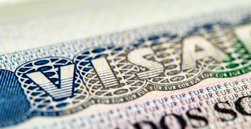 Internationa visa in passport close up view.