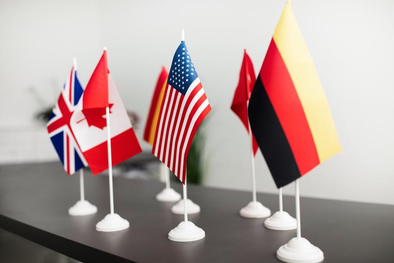 many-different-countries-flags-standing-on-office