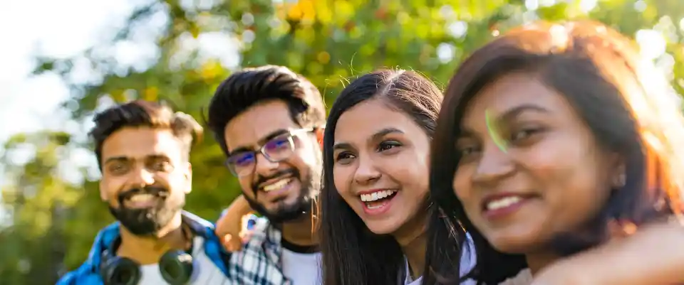 Smiling Friends Having Fun Outside Together