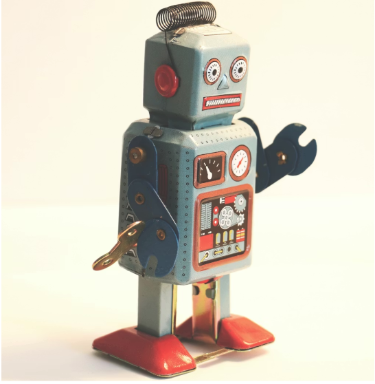 Image of a toy robot representing AI