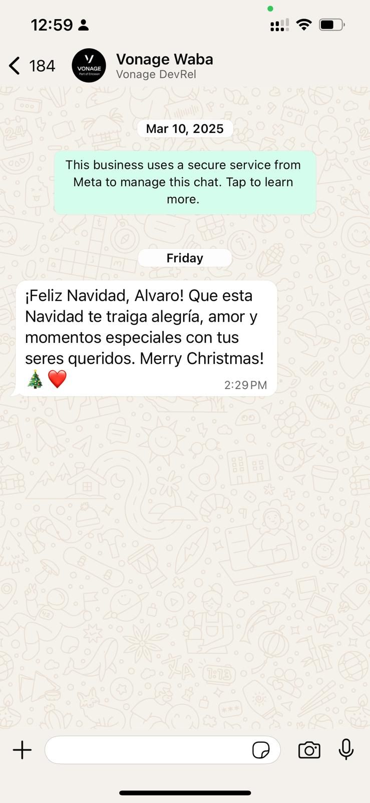 WhatsApp chat showing a message from Vonage DevRel that reads: '¡Feliz Navidad, Alvaro! Que esta Navidad te traiga alegría, amor y momentos especiales con tus seres queridos. Merry Christmas!' Message includes a Christmas tree and heart emoji and is timestamped 2:29 PM.