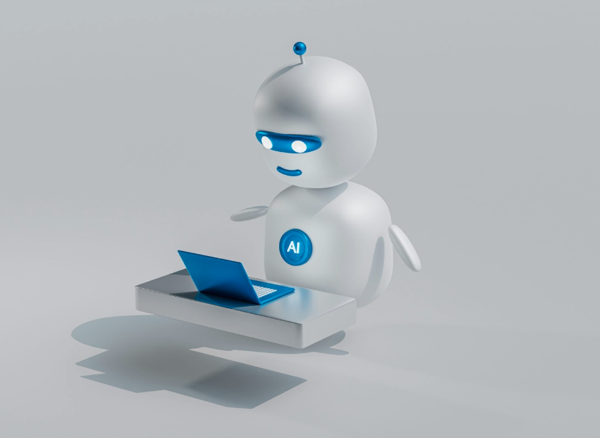 A small, futuristic robot with a blue visor works on a floating laptop in a minimalist setting. The robot has "AI" written on its chest.