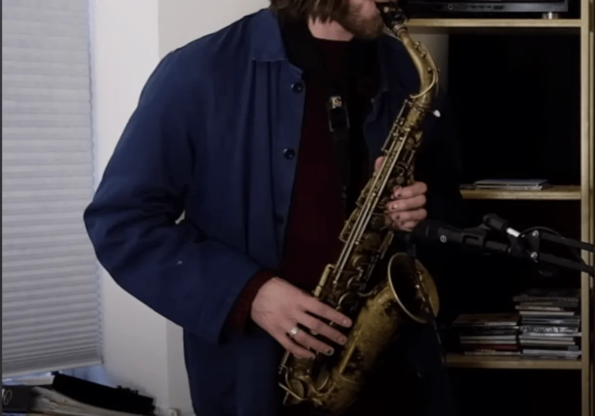 A man playing saxophone