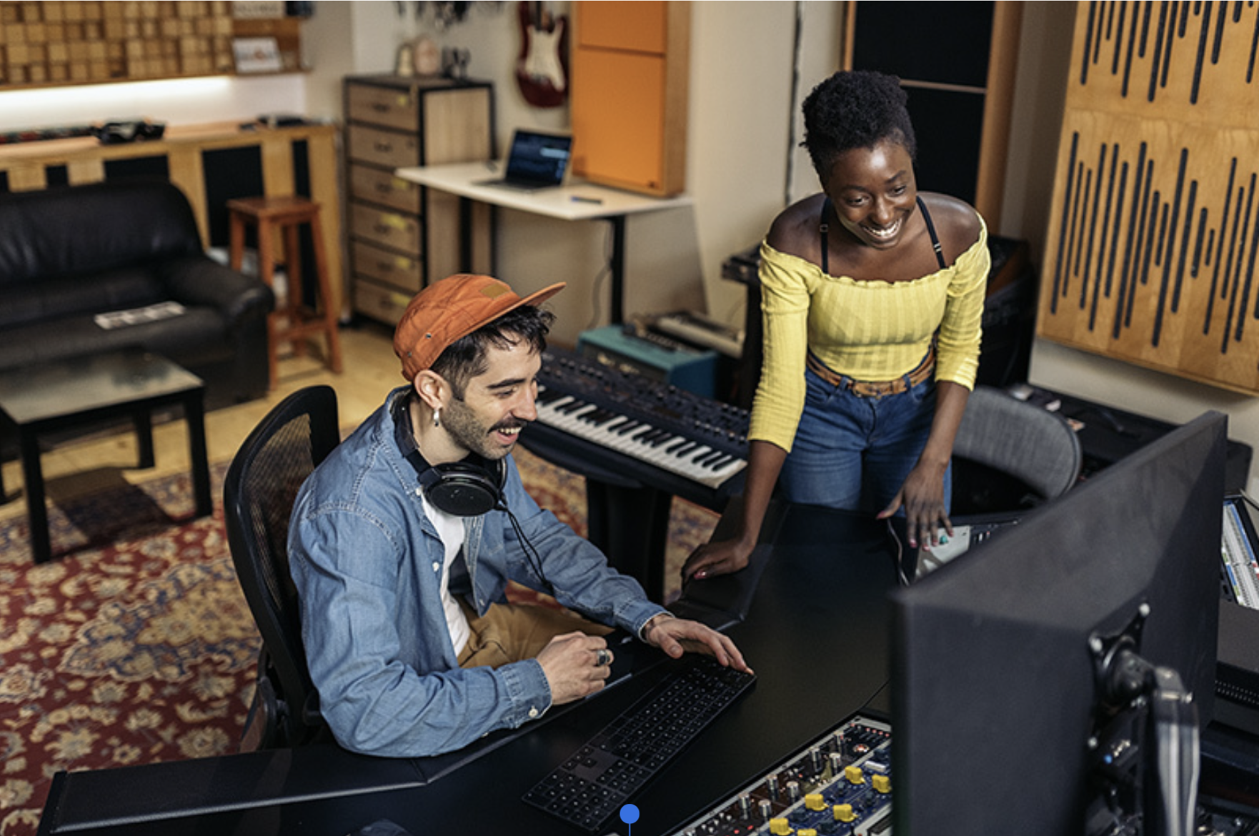 Singer and producer in a music studio releasing finished music