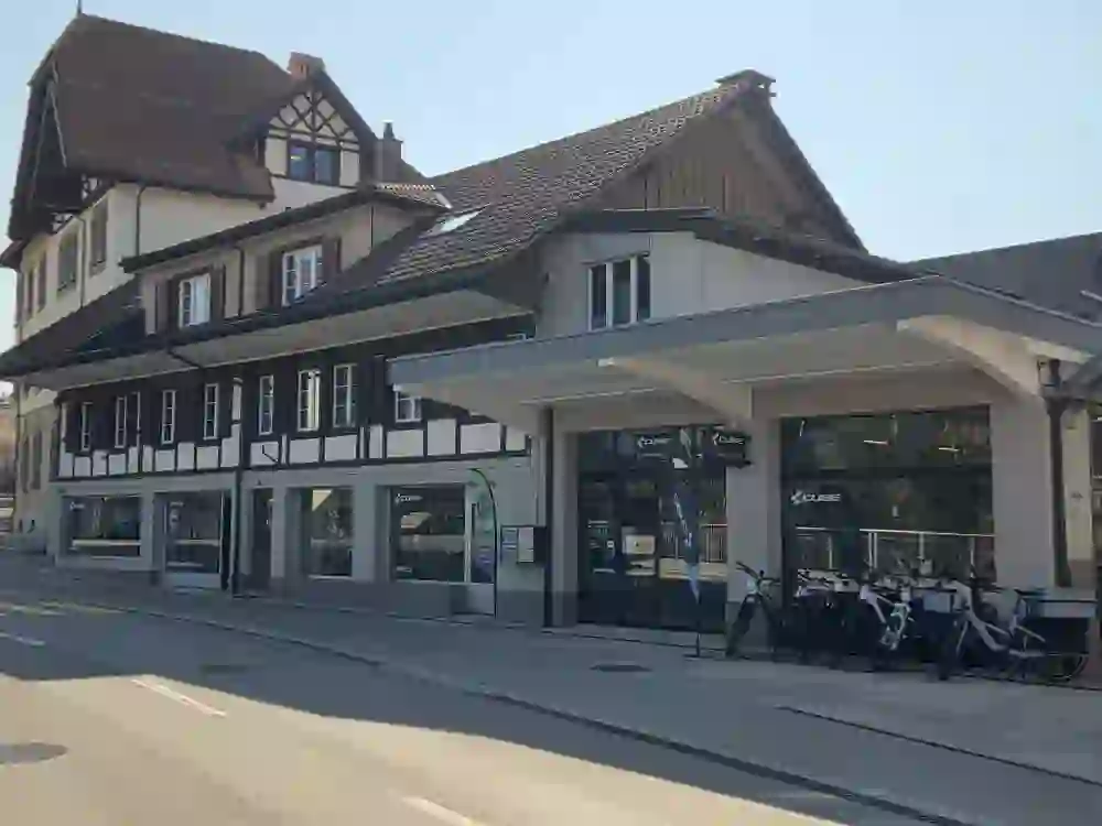 The picture shows the Cube Store bike shop in Schwarzenburg