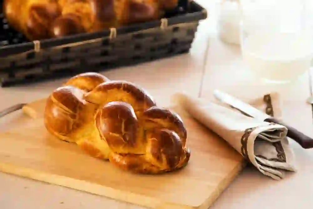 The picture shows a "Butterzopf", also known as a "Zopf", which is a popular Swiss bread, especially known for its use at breakfasts and special occasions such as Sunday breakfast.