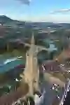 High above Bern, the view glides past the cathedral and the shimmering turquoise Aare. The city seems peaceful and vast, the evening light lends the scene a magical calm - a moment full of height, freedom and wonder.