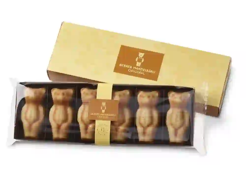 Dolcezza in confezione multipla: l'elegante confezione da 6 pezzi presenta l'Orso di Mandorle in tutta la sua varietà, ideale da condividere, regalare o gustare da soli.