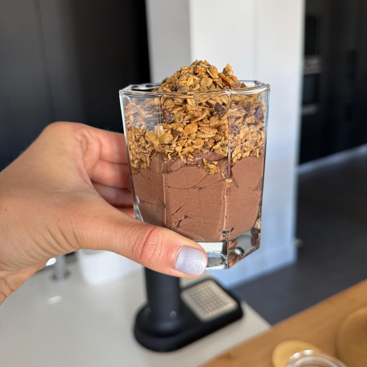 High-protein gestational diabetes breakfast photo of chocolate breakfast pudding topped with homemade peanut butter granola in a glass.