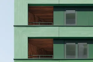 Moderne Wohnblöcke mit mintgrüner Putzfassade und raumhohen Fenstern