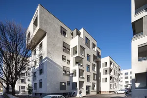 View of the buildings on Via Aslago showing the new oversailing vertical extension.