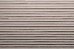 Putz Fassade Putzoberfläche Oberfläche Detail Kammzug grob Körnung StoColor Sto Architectural Colours Farbton Y15 70 10 Y15 80 05 matt gerichtet linear minearlisch zweifarbig polychrom