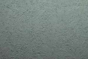 Putz Fassade Putzoberfläche Oberfläche Detail Kellenschlagputz Kellendruckputz Altdeutscherputz Klosterputz verwaschen Körnung StoColor Sto Architectural Colours Farbton B65 60 05 matt rau grob rustikal verwaschen