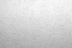 Putz Fassade Putzoberfläche Oberfläche Detail Kellenschlagputz Kellendruckputz Altdeutscherputz Klosterputz verwaschen Körnung StoColor Sto Architectural Colours Farbton naturweiss matt rau grob rustikal verwaschen