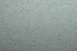 Putz Fassade Putzoberfläche Oberfläche Detail Kellenschlagputz Kellendruckputz Altdeutscherputz Klosterputz verwaschen Körnung StoColor Sto Architectural Colours Farbton B65 70 05 matt rau grob rustikal verwaschen