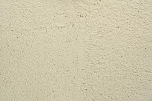Material: plaster facade surface detail trowel finish old german render 6mm grain StoColor Sto Architectural Colours Colour shade 16015 matt rough coarse rustic polychrome