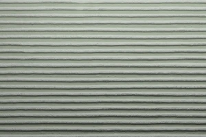 Material: Putz Fassade Putzoberfläche Oberfläche Detail Kammzug grob Körnung StoColor Sto Architectural Colours Farbton Y01 70 10 Y01 80 05 matt gerichtet linear minearlisch zweifarbig polychrom