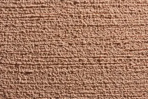 Putz Fassade Putzoberfläche Oberfläche Detail Besenzug Körnung StoColor Sto Architectural Colours Farbton 16095 matt gerichtet linear