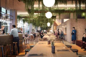 Belebtes Sockelgeschoss des Gebäudekomplexes “De Puls , Gastronomiebereich