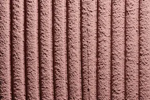 Putz Fassade Putzoberfläche Oberfläche Detail Kammzug grob Körnung StoColor Sto Architectural Colours Farbton 16140 matt gerichtet linear mineralisch